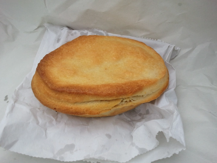 The Image shows a Clarks Pie On a White plateThere are few foods more synonymous with Cardiff’s working-class history than the humble Clarks Pie. Also known affectionately as a 'Clarkie', this hearty, gravy-filled meat pie has long held legendary status in the capital and beyond. It’s more than a snack—it’s a piece of South Wales history.