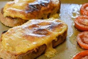 At first glance, Welsh rarebit might look like posh cheese on toast — but don't be fooled. This classic dish is a silky, savoury cheese sauce, often infused with mustard, ale, and a touch of spice, spooned generously over thick-cut toasted bread and grilled until bubbling and golden.